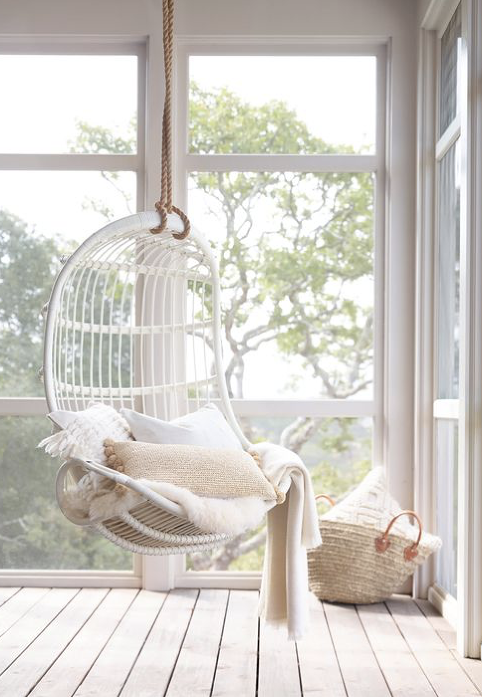 Hanging Rattan Chair | Serena and Lily | Covetboard Home